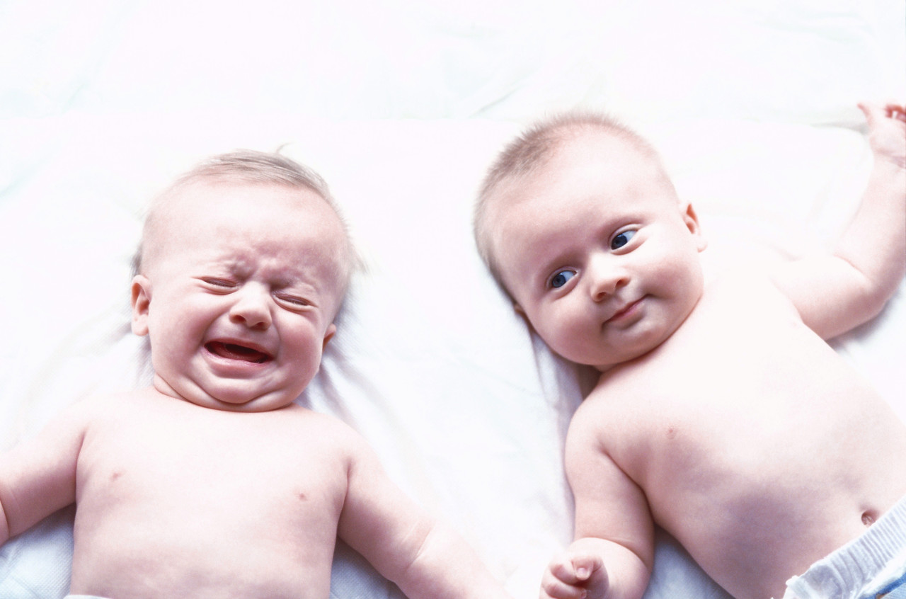 Twin Babies in Diapers